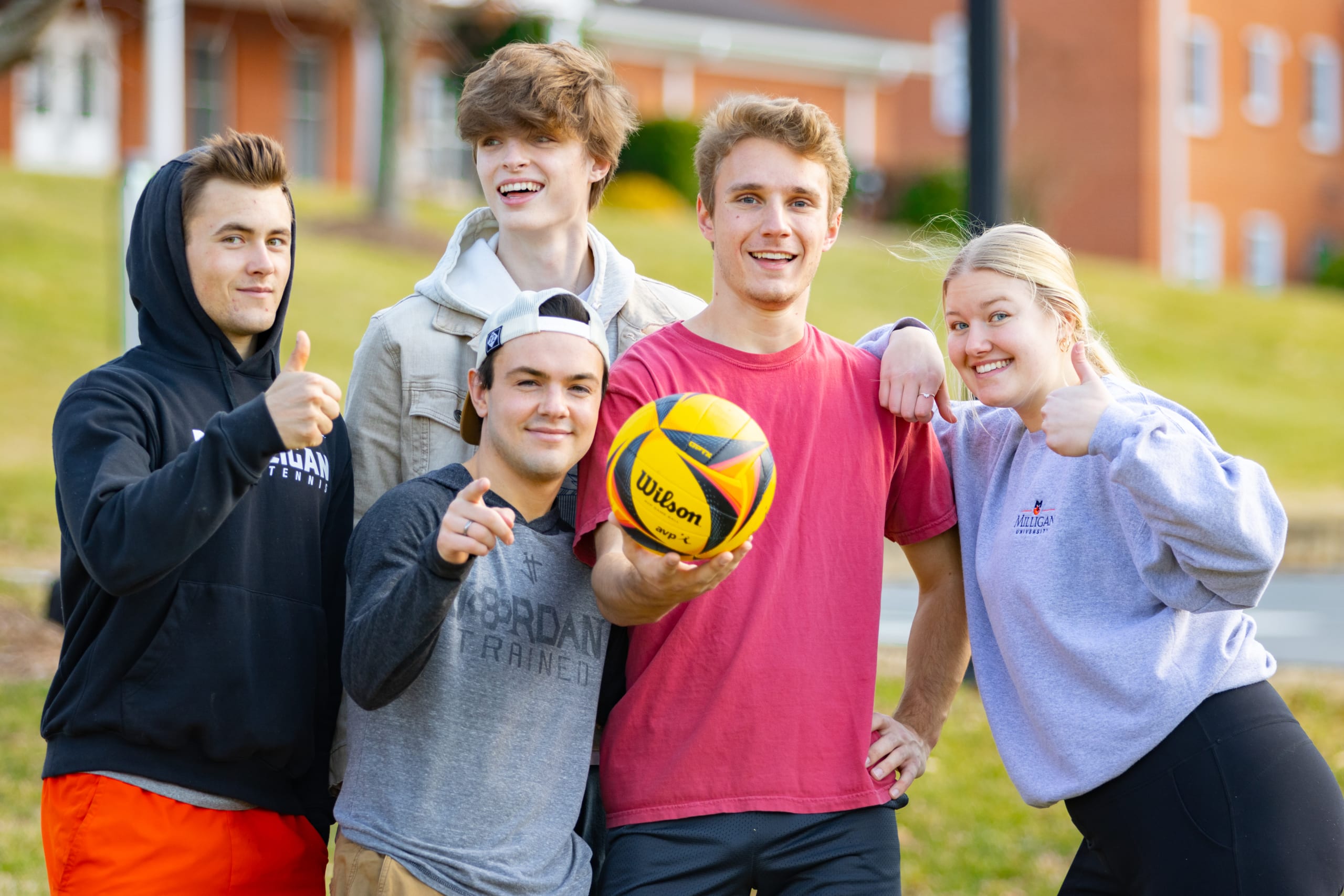 A group of students on Pardee lawn holding a soccer ball.